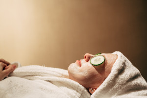 lady in white robe on hen group spa day 